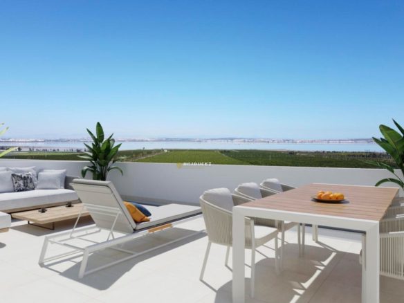 Modern duplex with views of the pink lake for sale in Torrevieja.