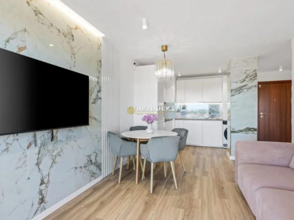For sale a stunning, fully renovated two-bedroom apartment located in Punta Prima.