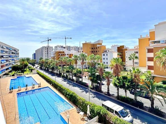For sale apartment with sea view in Punta Prima.